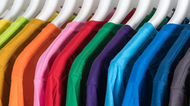colorful blank tshirts on hangers, tshirts that DTF transfers can be applied to